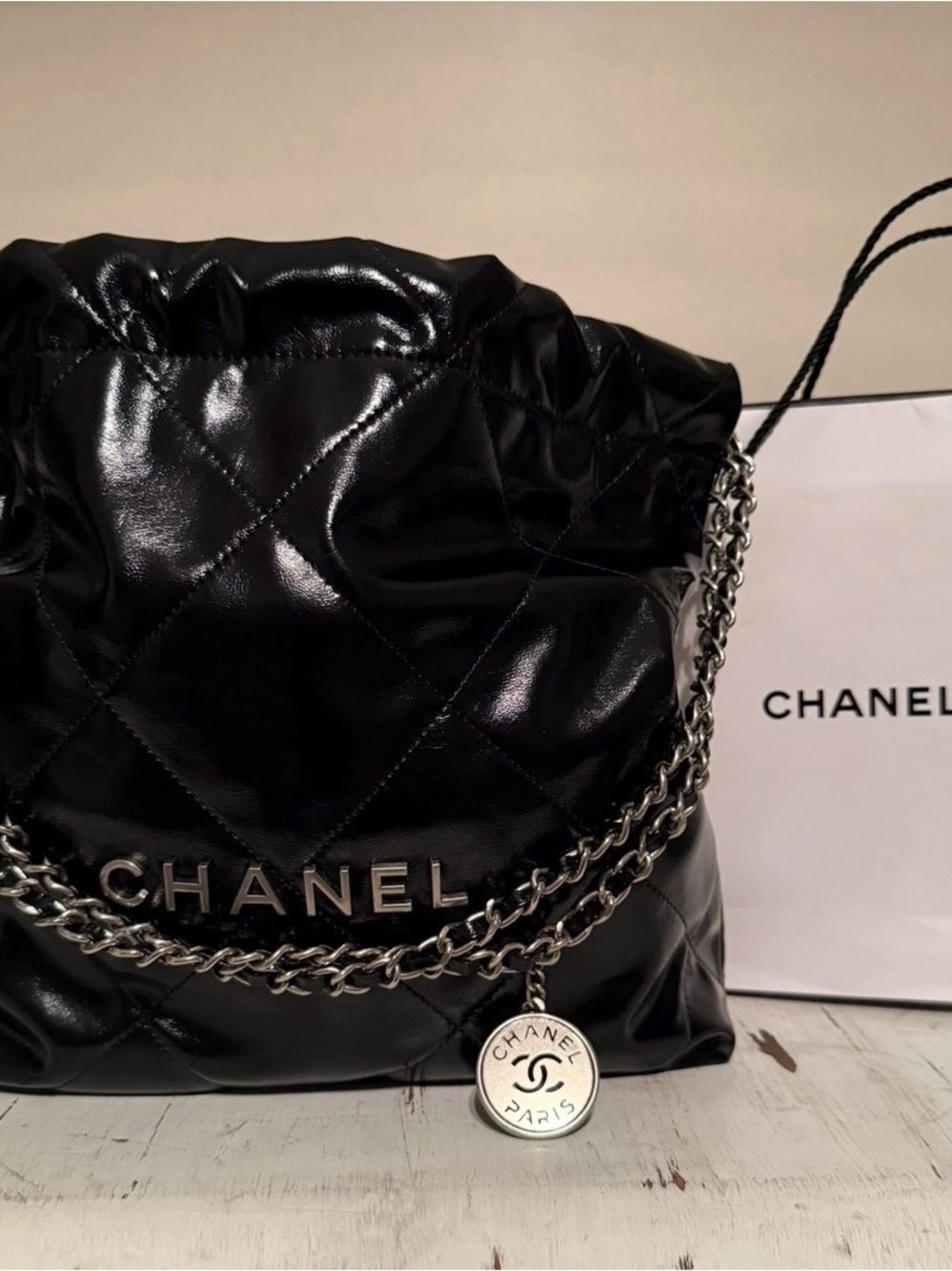 Black Quilted Drawstring Shoulder Bag with Silver Chain